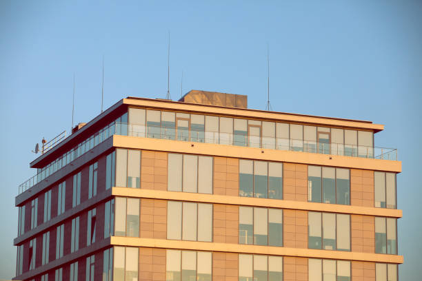 istock A high multi-family apartment block against a blue sky. 1218563954