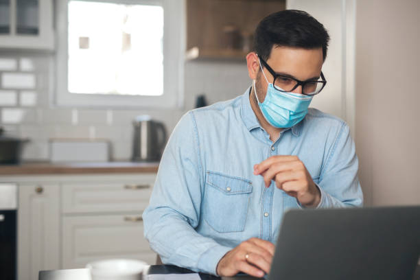 istock Man wearing mask due to virus pandemic. 1218564755
