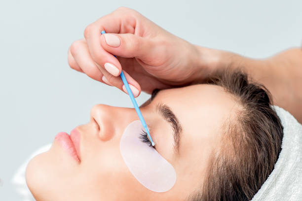 istock Hand wipes eye by cotton bud. 1218564811