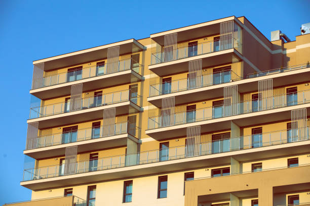 istock A high multi-family apartment block against a blue sky. 1218565447