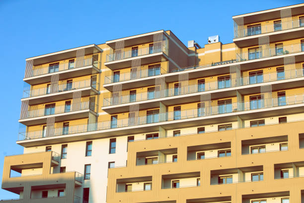 istock A high multi-family apartment block against a blue sky. 1218565797