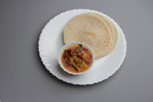 istock South Indian breakfast cuisine 'Dosa' with 'Sambar'. 1218566368