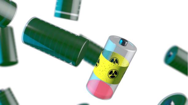 istock Radioactive battery among charged bataries on a white background. 1218566467