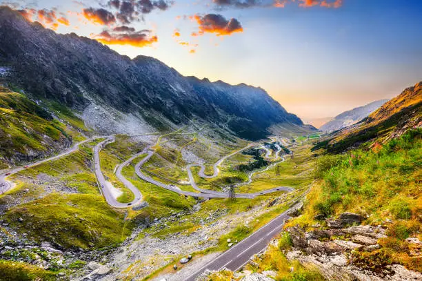 View of Transfagarash highway and valley in mountains of Romania. The most beautiful road in Europe. Location: Carpathian mountains, Fagaras ridge, Romania, Europe.