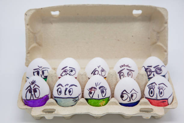 istock Easter eggs on the theme of coronavirus, painted funny masked faces on Easter eggs, decorated for Easter, 1218567326