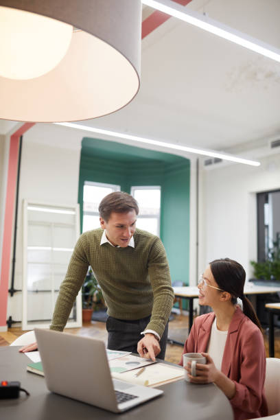 istock Businessman with secretary at office 1218567525