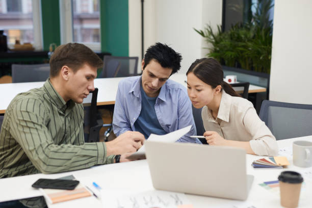istock Business people examining the contract 1218568349