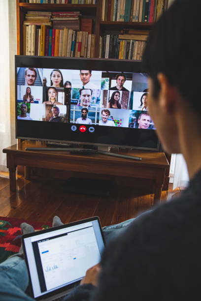 istock Woman in front of a device screen in video conference for work 1218569395