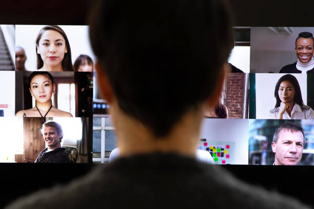 istock Woman in front of a device screen in video conference for work 1218569396