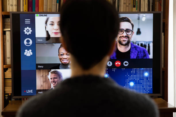 istock Woman in front of a device screen in video conference for work 1218569624