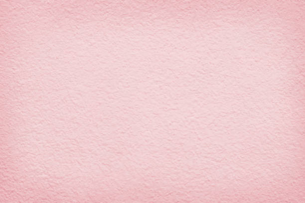 istock Light pink color concrete cement wall texture for background and design art work. 1218569635