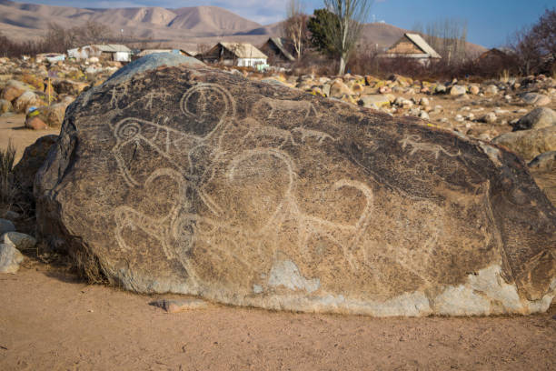 istock Goat petroglyph. Issyk-Kul, Kyrgyzstan 1218569841