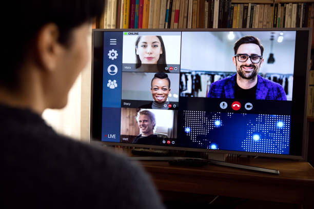 istock Woman in front of a device screen in video conference for work 1218569928