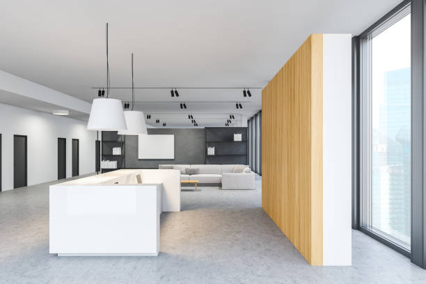 istock White reception in wooden office with sofa 1218571330