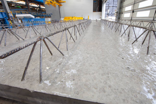 istock Precast Concrete Girder slabs in production 1218571348
