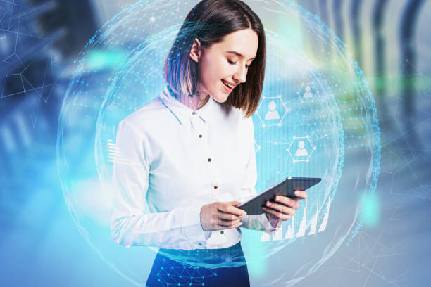 istock Businesswoman with tablet, network GUI 1218571699