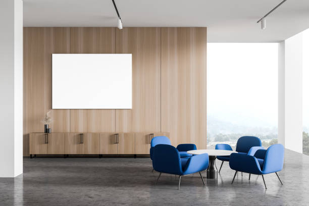 istock Panoramic office waiting room armchairs and poster 1218571756