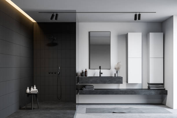 istock White and black bathroom, sink and shower 1218571899