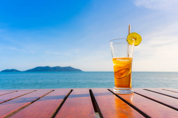 istock lemon tea glass placed by the sea 1218572139