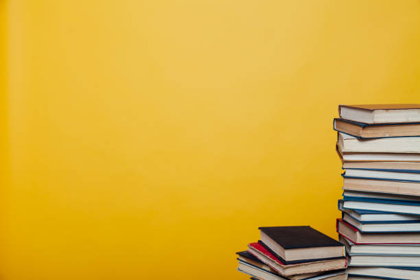 istock stacks of educational books university library background 1218574198
