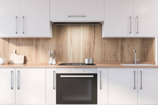 istock Wooden kitchen with white countertops 1218574259