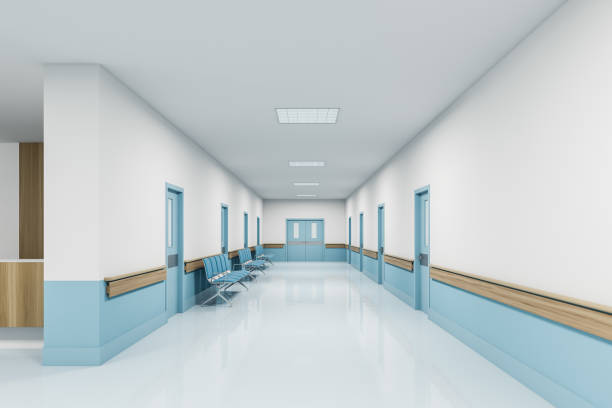 istock Perspective view of empty hospital corridor 1218574870