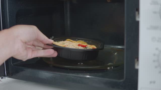 Frozen food heating in microwave oven,Video montage