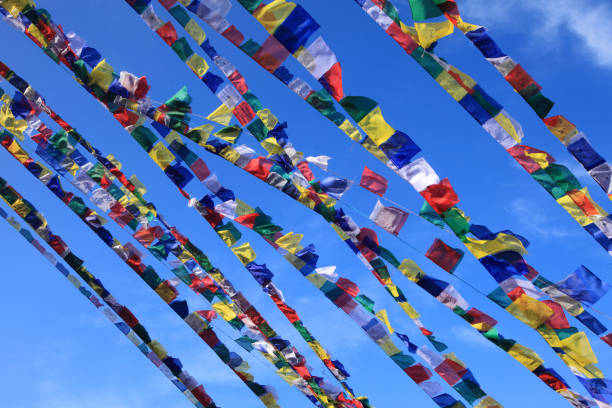 istock Tibetan Buddhist prayer flags against  blue sky 1218577146