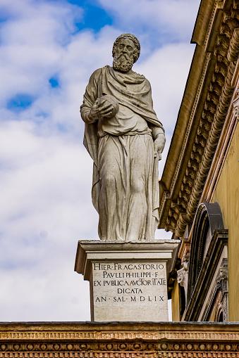 White marble statue of Girolamo Fracastoro (1476-1553), physician, philosopher, astronomer and geographer at Piazza dei Signori in Verona, Italy