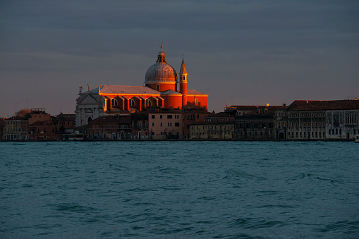 twilight view to Church Il Redentore through Giudecca canal in Venice, Italy