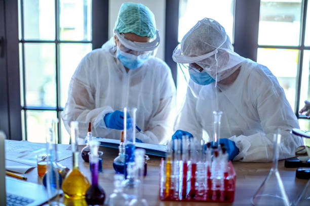 istock Doctors in the laboratory analysis and sampling of Covid-19 1218582101