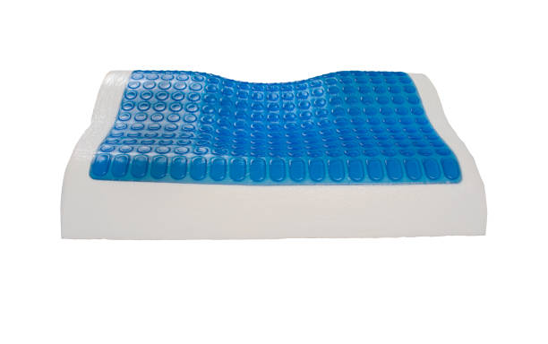 istock Orthopedic latex pillow with memory foam effect, hydro gel layer, cooling effect. Medical treatment pillow for sleep under the head with a recess under the neck isolated on white background. 1218583538