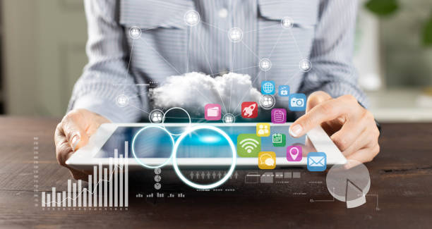 istock Startup launch concept on tablet with hologram 1218584187