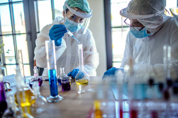 istock Microbiologist in the laboratory analysis and sampling of Covid-19 1218584278