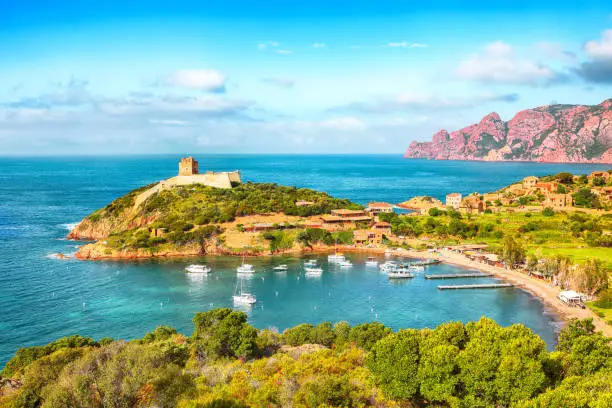 Girolata bay in natural reserve of Scandola.  It cannot be reached by car, only by walking or boats . Location:  Gulf of Girolata, Corse du Sud,  Corsica, France, Europe