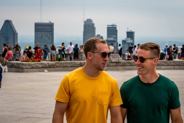istock Homosexual couple visiting Montreal in summer. 1218587919