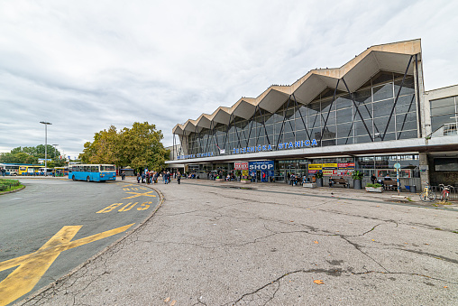 Novi Sad, Serbia - 03, October, 2019: Building of Train station in Novi Sad Serbia. Main Train and Bus station in the city of Novi Sad with people waiting for the transportation.