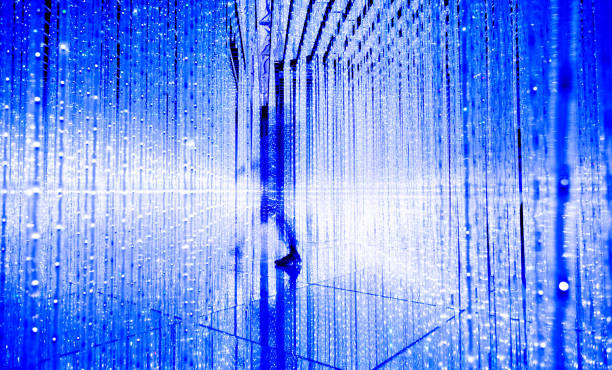 Man walking in the blue lights.