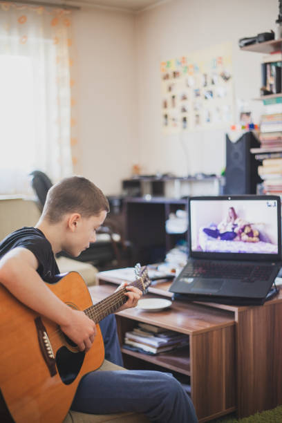 istock Teleconferencing to play music - having fun on lockdown 1218590717