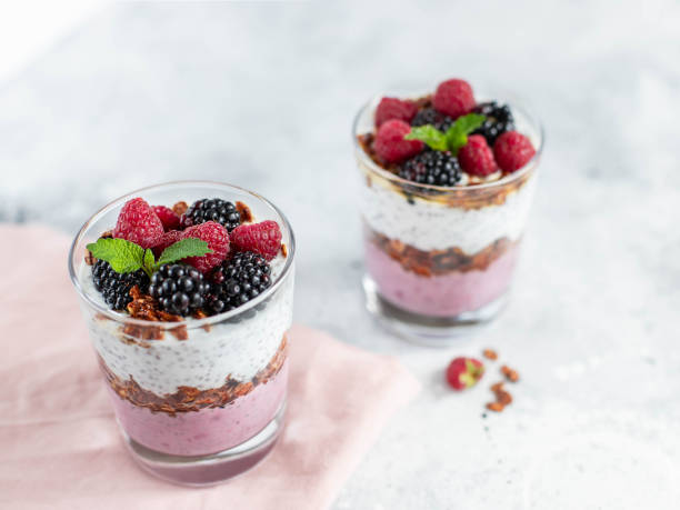 istock granola in a glass with chia yogurt and fresh berries 1218591343