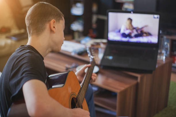 istock Teleconferencing to play music - having fun on lockdown 1218591666