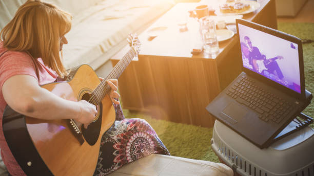 istock Teleconferencing to play music - having fun on lockdown 1218591881