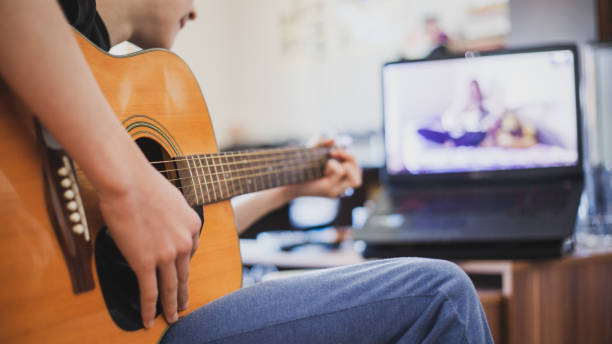 istock Teleconferencing to play music - having fun on lockdown 1218591918