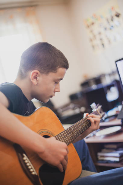 istock Teleconferencing to play music - having fun on lockdown 1218592414