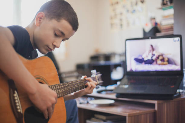 istock Teleconferencing to play music - having fun on lockdown 1218592498