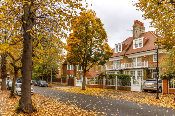Chiswick suburb street in autumn, London, England Chiswick suburb street in autumn, London, England chiswick stock pictures, royalty-free photos & images