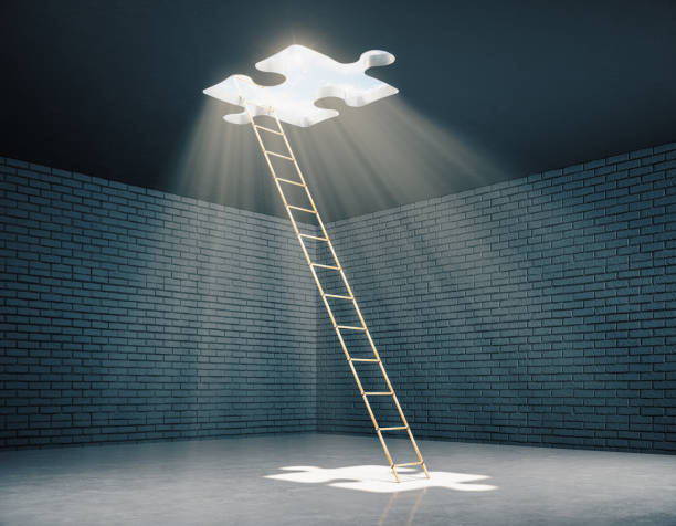 istock Stairway to window in form puzzle to light. 1218593364