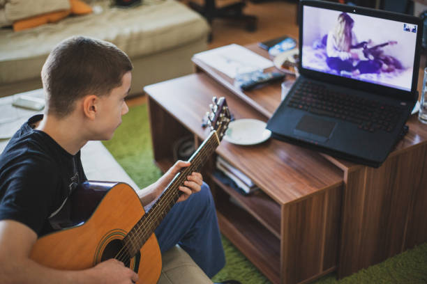istock Teleconferencing to play music - having fun on lockdown 1218595285