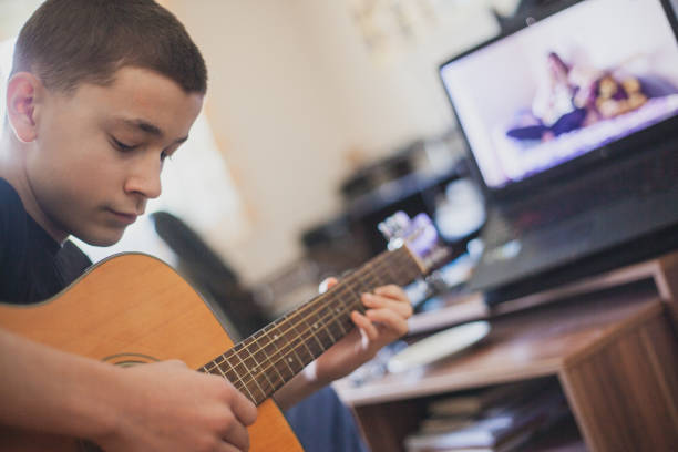 istock Teleconferencing to play music - having fun on lockdown 1218595578