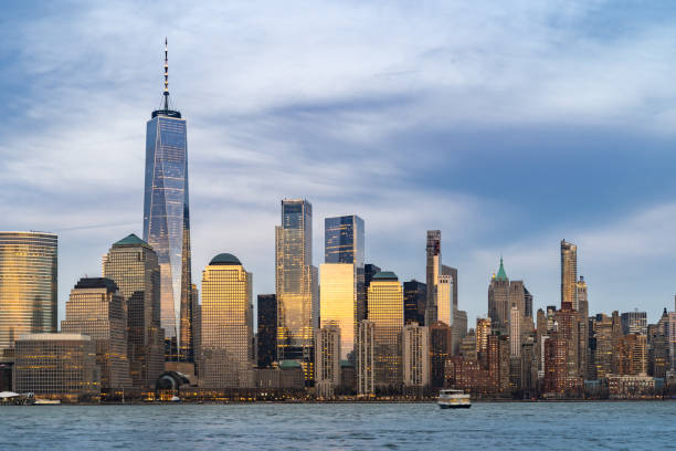 Lower Manhattan New York New York city NYC Lower Manhattan Skyscraper skylines building cityscape sunset at dusk from New Jersey. Lower Manhattan is the largest financial district in the world. hudson stock pictures, royalty-free photos & images